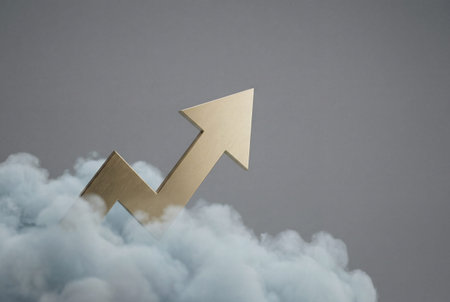Gold arrow ascending from soft blue clouds against gray backdrop, symbolizing upward progress, financial growth, and positive direction in motivational and achievement themesの素材