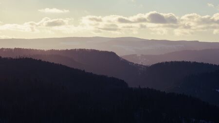 Mountains chain at magical sunset. View of Carpathian Mountains at the sunset