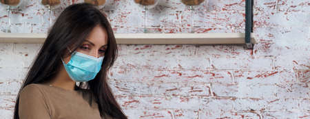 Portrait of a female worker wearing maskの写真素材