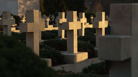 View of crosses on graves at sunset in Ukraine