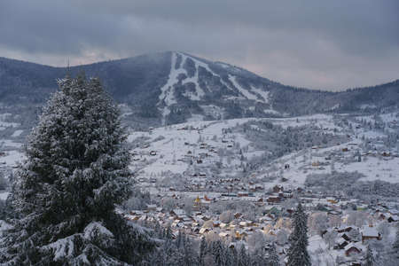 Top view of snowy Slavske village and Trostyan mountain Ukraineの写真素材