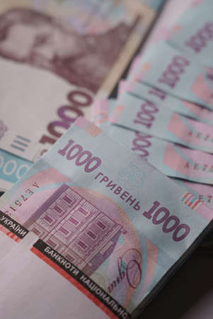 Vertical shot of Ukrainian Hryvnia banknotes bundle pack