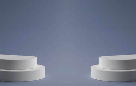 Two white podiums on blue background with copy spaceの写真素材