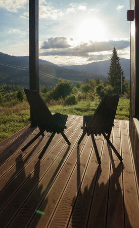 Modern clothes hanger stand and mirror in modern houseの写真素材