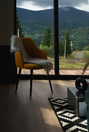 Round Modern black vase with hole on black table with copy spaceの写真素材