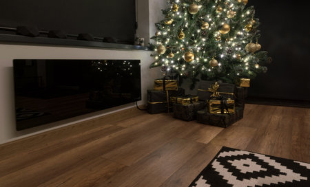 Modern black smart electric convector heater in decorated for Christmas cozy houseの写真素材