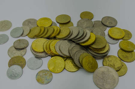 stack of silver and gold moneyの写真素材