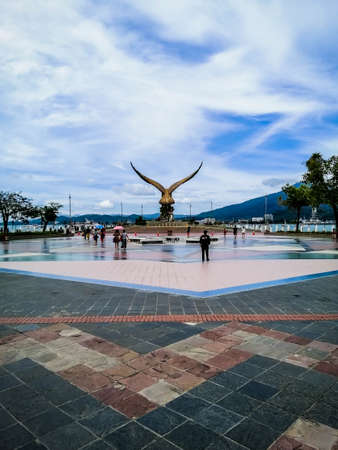 Langkawi, Malaysia - December 18, 2019: The back view of Eagle Statue at Dataran Lang. It is the symbol of Langkawi Island.のeditorial素材