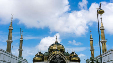 Kuala Terengganu, Malaysia - December 10, 2019: Crystal Mosque or Masjid Kristal, a grand structure made of steel, glass and crystal. View from below with clear blue sky as background.のeditorial素材