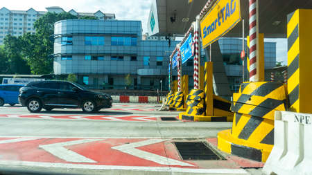 Selangor, Malaysia - November 28, 2019: The varoius type of vehicle road toll such as Touch'NGo and Smart Tag at PLUS Highway near Serdang.のeditorial素材