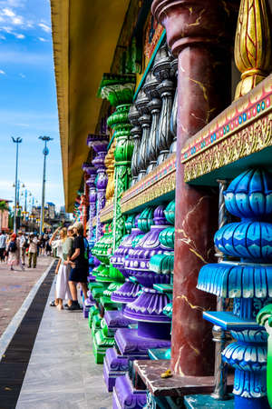 Gombak, Malaysia - January 4, 2020: Side view of beautiful and colorful architectural design of the Hindu temple building at the Famous and Iconic limestone Batu Caves in Malaysiaのeditorial素材