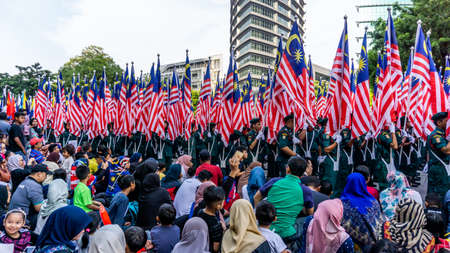 Putrajaya, Malaysia - August 31, 2019: The close up view of the parade contingent marching at the 62nd Independence day or Merdeka Day celebration of Malaysia in Putrajaya.のeditorial素材