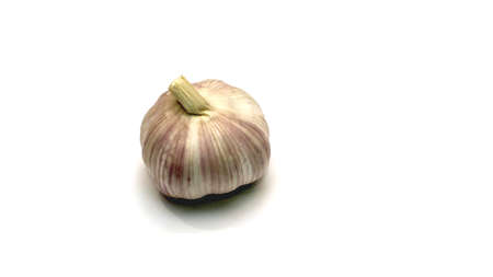 Raw garlic on isolated white background, include cropping background.