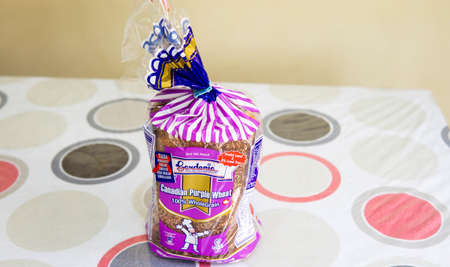 Sungai Buloh, Malaysia - April 13, 2020: The purple packaging of Gardenia bread Canadian Purple...