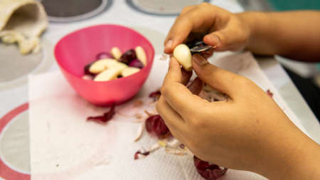 Close up view of fried mackerel fish serve in a plate on a table background. Traditional Malaysia served food for lunch.の写真素材