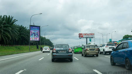 Selangor, Malaysia - June 13, 2020: The view of the highway road in Malaysia from the car windscreen...
