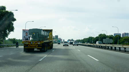 Selangor, Malaysia - July 3, 2020: The view of Elite Highway road from car windscreen view. It is...