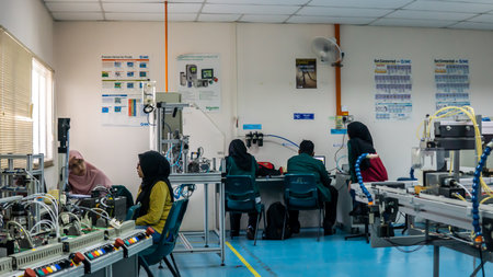 Bangi, Malaysia - October 10, 2019: The scene in the industrial machinery laboratory. Engineering students doing some grouping task and assignment. University lifestyle. Automation and robotic objectのeditorial素材