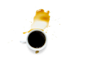 A white ceramic cup of black espresso coffee and light bubble with brown stained of coffee water...