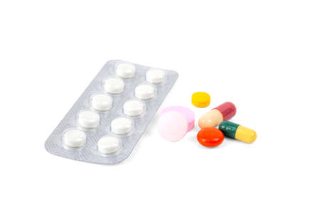 Medicine and pill in tablet isolated on white background