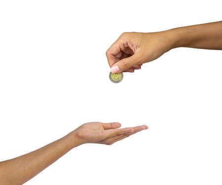 A hand holding European money coin giving to a woman hand, concept for earning or donation, isolated...