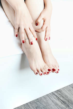girl use red nail polishの写真素材
