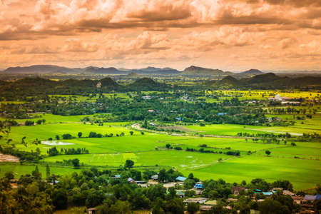 Thailand landscape of rural city and mountain under the cloudy skyの写真素材