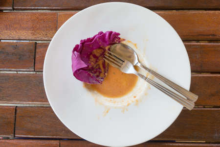 leftover food debris on dishの写真素材