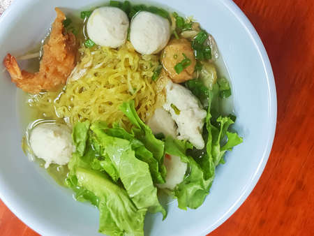 Thai food style:A prawn noodle soup served with pork and meaballsの写真素材