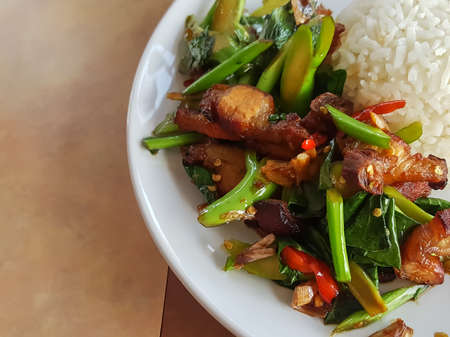 Close-up,Thai food style:Stir-fried kale with crispy pork and riceの写真素材