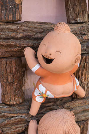 close-up,funny doll on a wooden ladder,process colorの写真素材