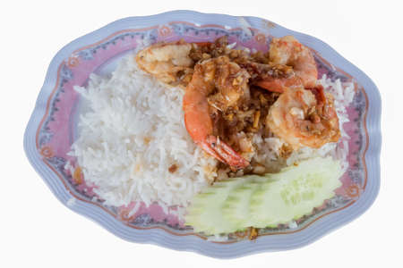 Thai food style:Fried shrimp with garlic and black pepper, serve with cooked riceの写真素材
