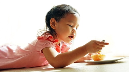 Kid enjoying dessertの写真素材