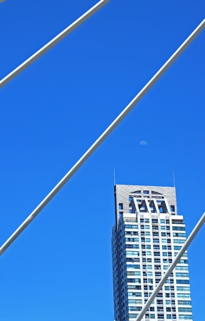 building with blue sky and moonの写真素材