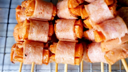 cocktail sausages with bacon rollの写真素材