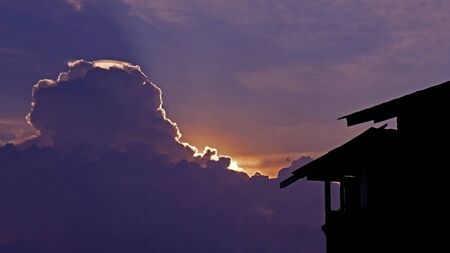 House silhouette with gorgeous sunset sky backgroundの写真素材