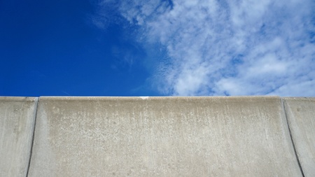 barrier fence on the highway with blue skyの写真素材