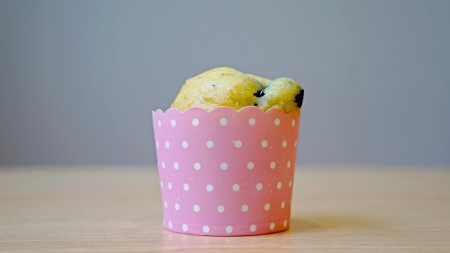 Blueberry muffin on wooden table