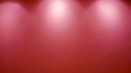 Empty red wall with lightsの写真素材