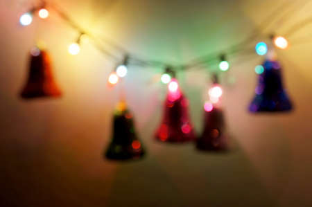 Defocused of Christmas bells with light at nightの写真素材