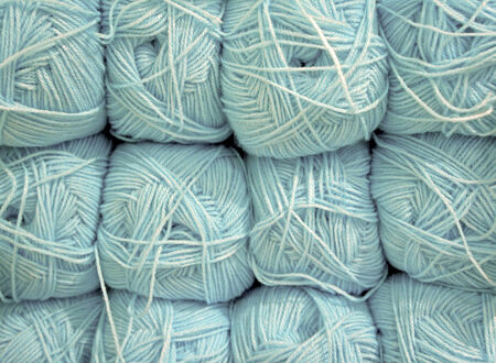 close up shot of blue pastel tone yarn ballsの写真素材