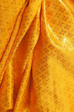 Gold fabric texture for backgroundの写真素材