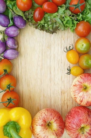Healthy Organic Vegetables on a Wooden Background  Frame Designの写真素材