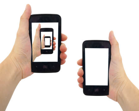 Female hand holding smartphone with blank screen  Isolated on white background の写真素材