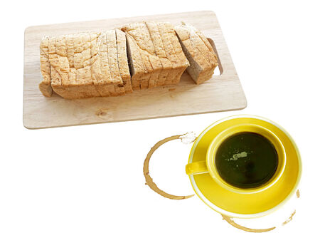 coffee and fresh sliced bread isolated on whiteの写真素材