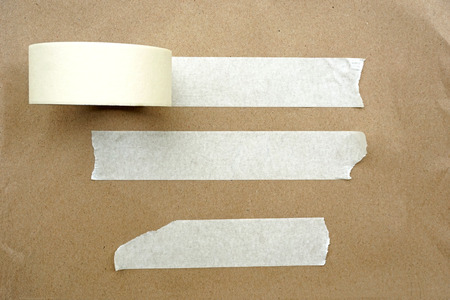 Brown paper with white tape for background