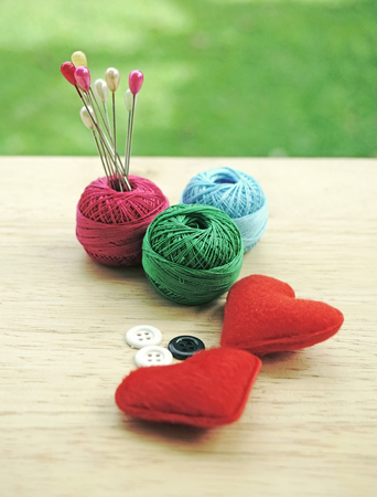 sewing kit, needles, thread and measuring tapeの写真素材