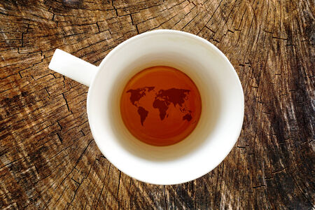 world map of empty white cup of hot coffee