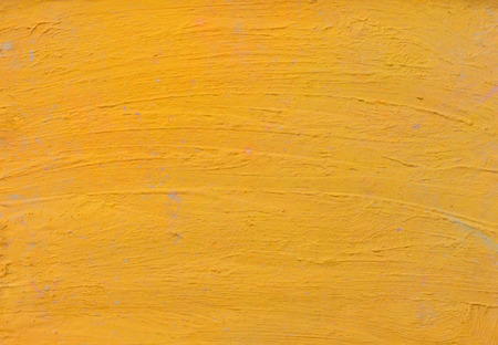 Yellow cement wall textureの写真素材