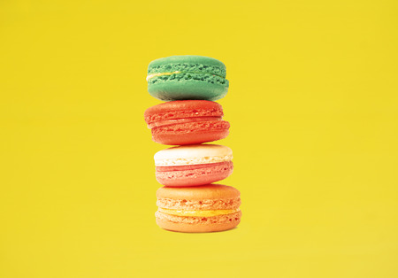 macaroon cookies on yellow の写真素材